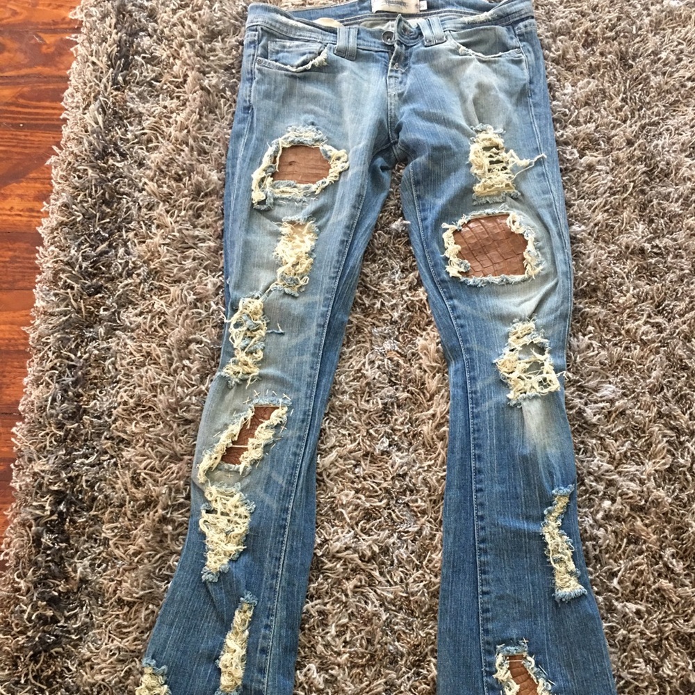 Alligator distressed jeans